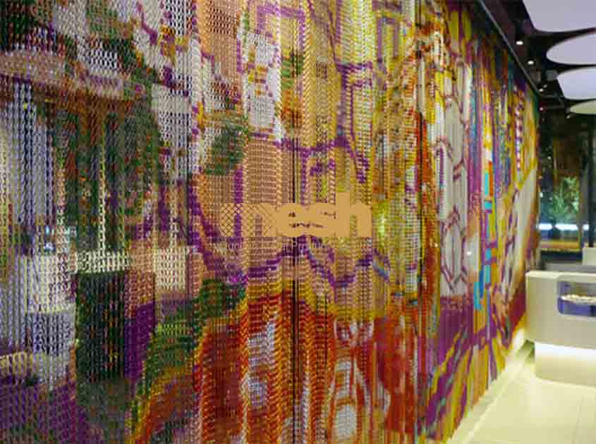 How does Chain Link Curtain provide a sense of openness in interior designs